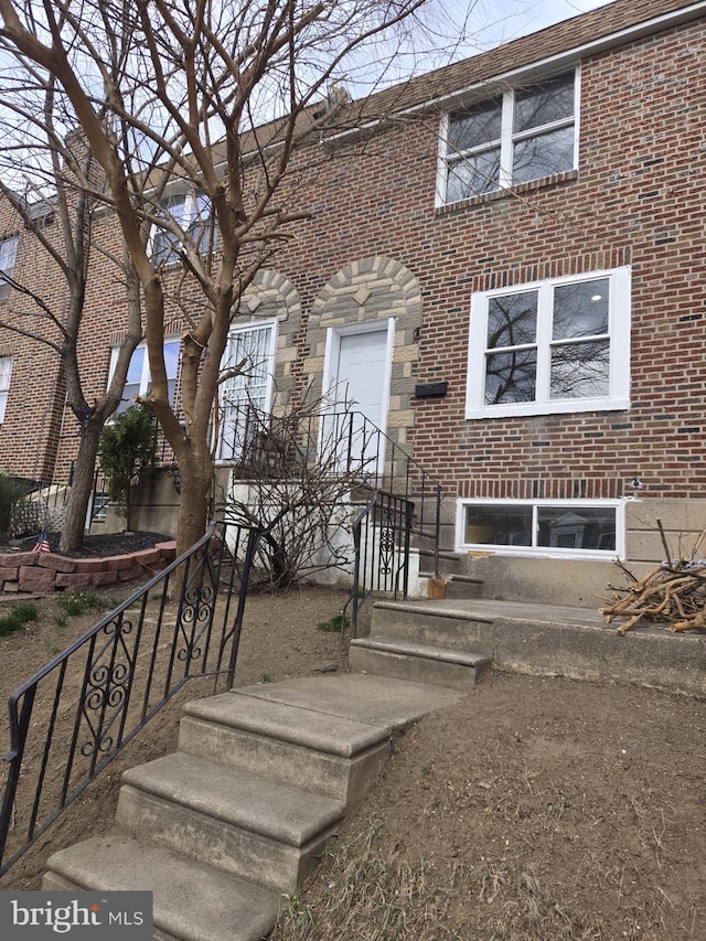 view of front of property with brick siding