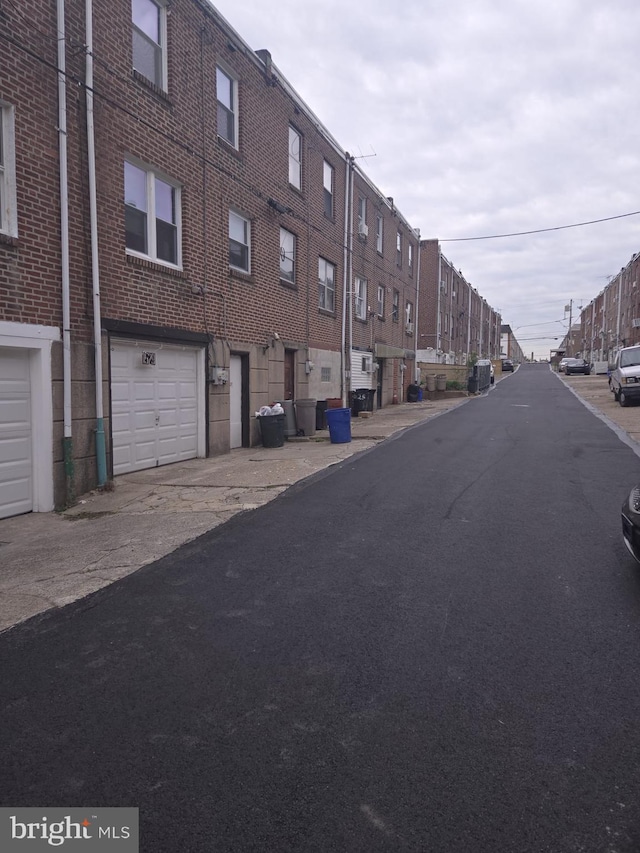 view of road with a residential view