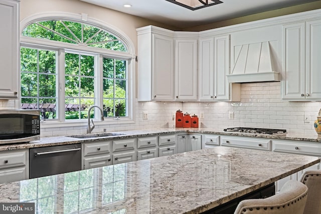 10310 Mystic Meadow Way, Oakton, VA 22124 - kitchen featuring a sink, white cabinetry, premium range hood, and stainless steel appliances