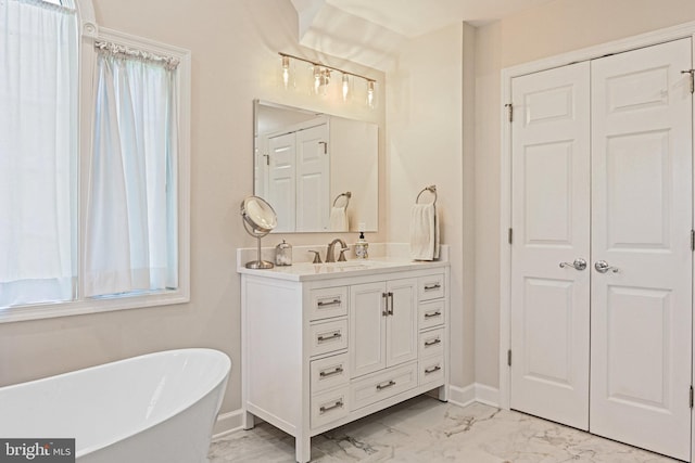 10310 Mystic Meadow Way, Oakton, VA 22124 - full bath with a closet, marble finish floor, a soaking tub, and vanity