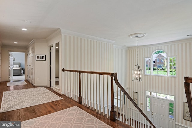 10310 Mystic Meadow Way, Oakton, VA 22124 - hall with crown molding, wood finished floors, and a notable chandelier