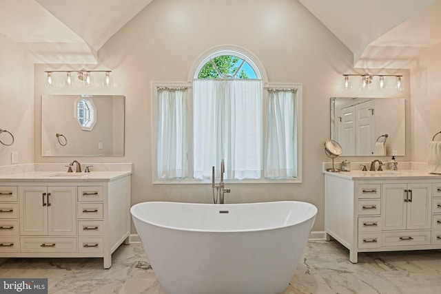 10310 Mystic Meadow Way, Oakton, VA 22124 - full bath with a sink, marble finish floor, and vaulted ceiling