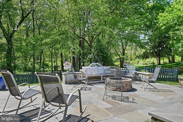 10310 Mystic Meadow Way, Oakton, VA 22124 - view of patio / terrace featuring an outdoor fire pit and fence