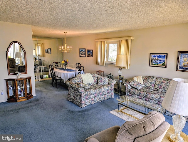 living area featuring a textured ceiling, a notable chandelier, and carpet