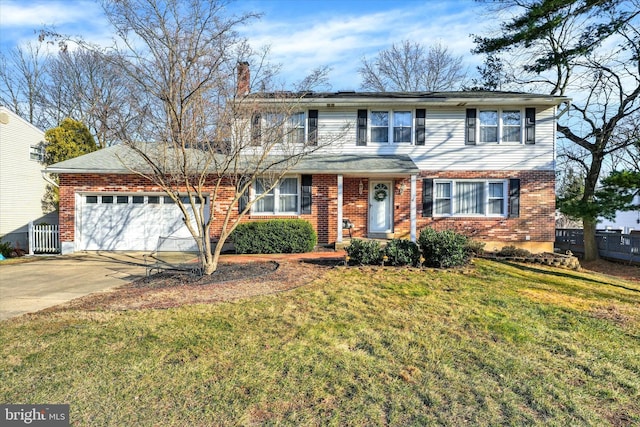 traditional home featuring concrete driveway, an attached garage, brick siding, and a front yard