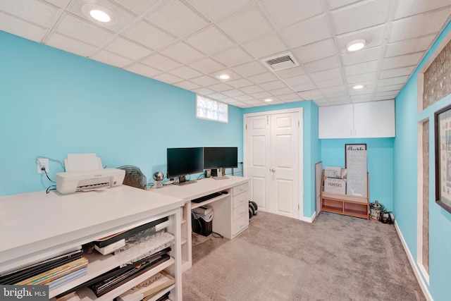 office featuring visible vents, light carpet, a drop ceiling, recessed lighting, and baseboards