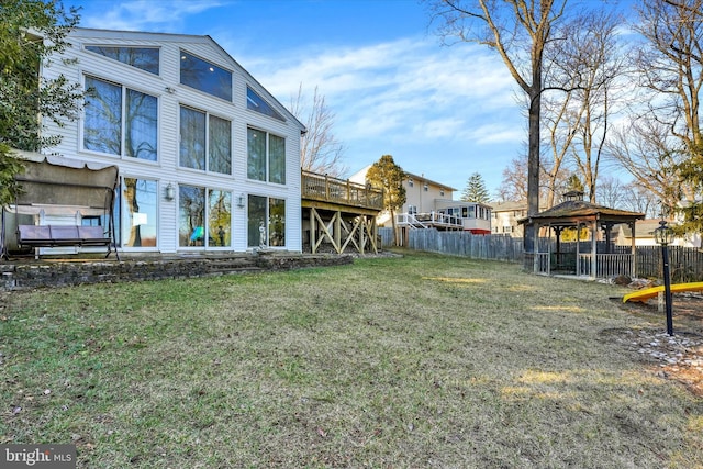 exterior space featuring a gazebo and fence