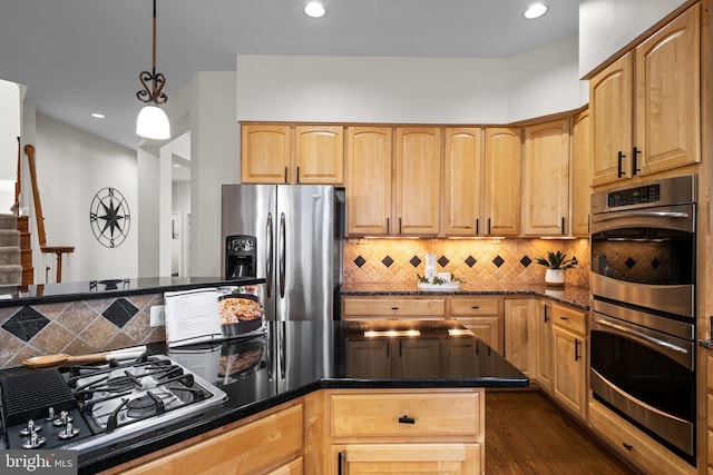 kitchen with stainless steel appliances, dark wood-style flooring, decorative backsplash, dark stone countertops, and pendant lighting