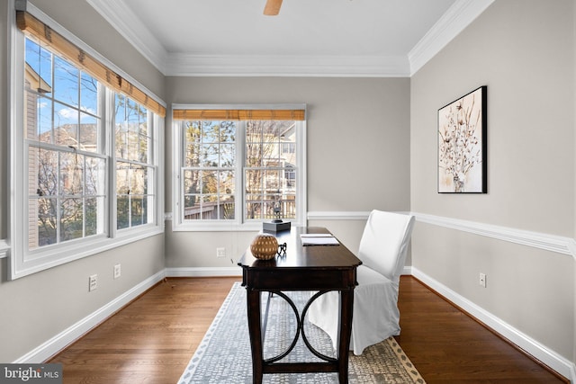 home office with a healthy amount of sunlight, baseboards, wood finished floors, and ornamental molding