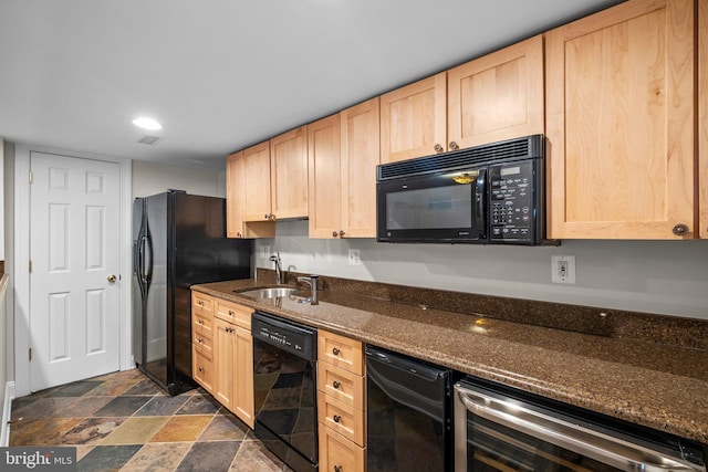 kitchen featuring black appliances, beverage cooler, a sink, and light brown cabinetry