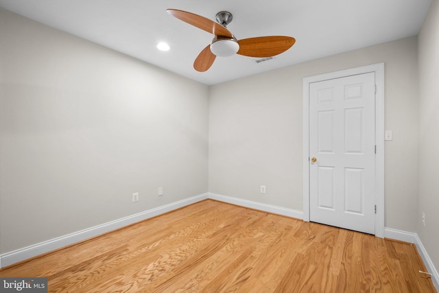 spare room with visible vents, baseboards, a ceiling fan, light wood-style flooring, and recessed lighting