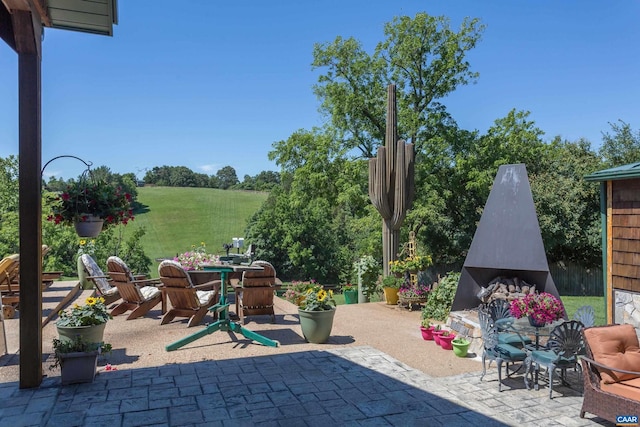 240 Stoneleigh Rd, Palmyra, VA 22963 - view of patio with an outdoor fireplace