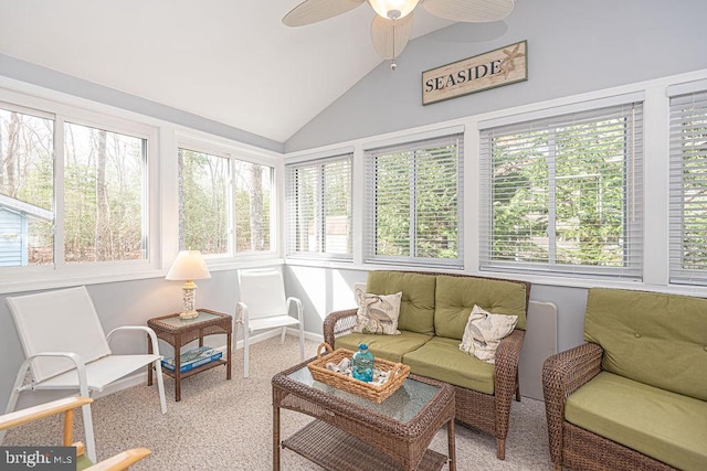 sunroom / solarium featuring ceiling fan and lofted ceiling