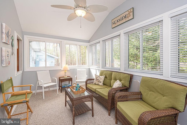 sunroom / solarium with ceiling fan and vaulted ceiling