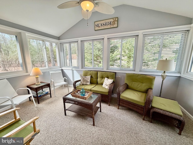 sunroom featuring lofted ceiling and ceiling fan