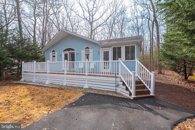 view of front of property featuring a deck