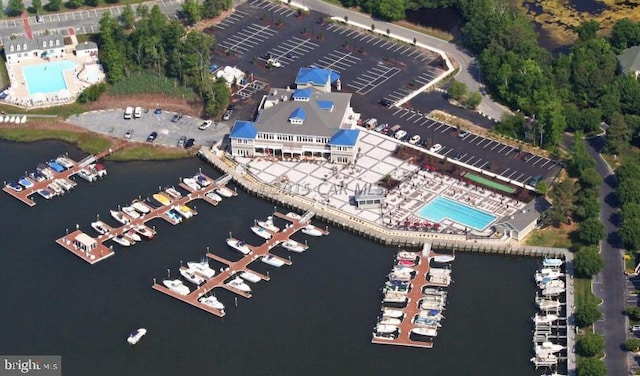 birds eye view of property featuring a water view