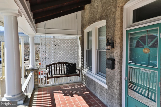 view of patio featuring a porch