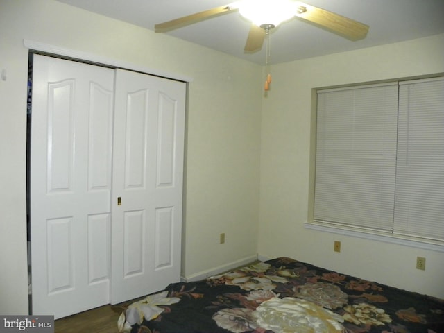 bedroom with a closet and ceiling fan