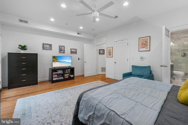 bedroom featuring light wood-style flooring, recessed lighting, visible vents, and baseboards