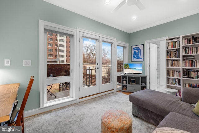 living room featuring ornamental molding, a ceiling fan, recessed lighting, french doors, and baseboards