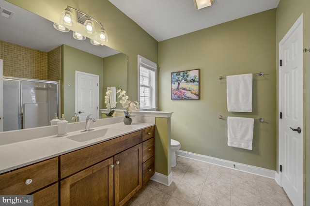 bathroom featuring vanity, baseboards, visible vents, a stall shower, and tile patterned flooring