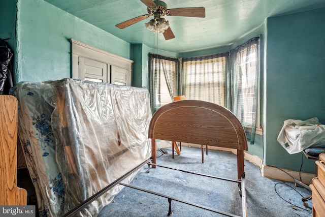 interior space featuring a ceiling fan