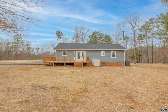 back of house featuring crawl space, cooling unit, a wooden deck, and french doors