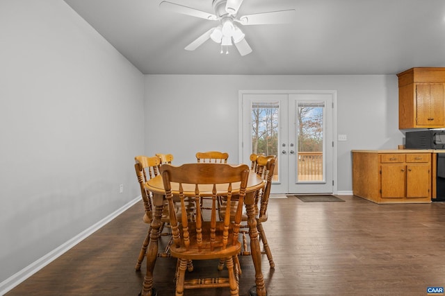 dining room with french doors, baseboards, ceiling fan, and dark wood-style flooring