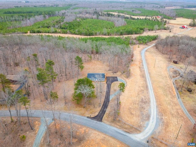 birds eye view of property with a rural view