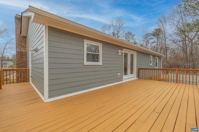 wooden deck featuring french doors