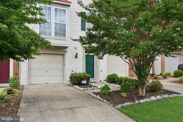 7315 Serenade Cir, Clinton, MD 20735 - view of front of home featuring concrete driveway and an attached garage