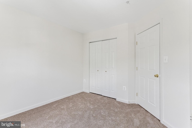 7315 Serenade Cir, Clinton, MD 20735 - unfurnished bedroom with carpet flooring, a closet, and baseboards