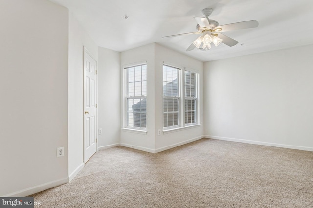 7315 Serenade Cir, Clinton, MD 20735 - spare room featuring carpet floors, baseboards, and ceiling fan