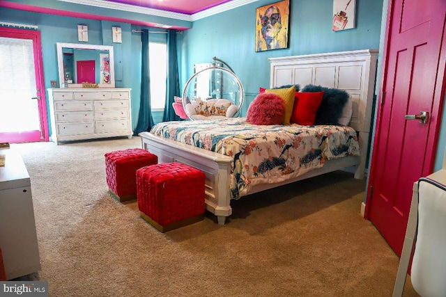 carpeted bedroom featuring crown molding