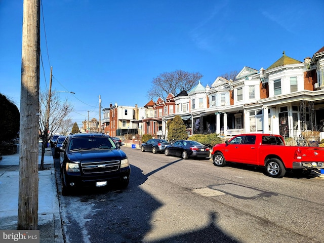 view of road with street lighting and a residential view