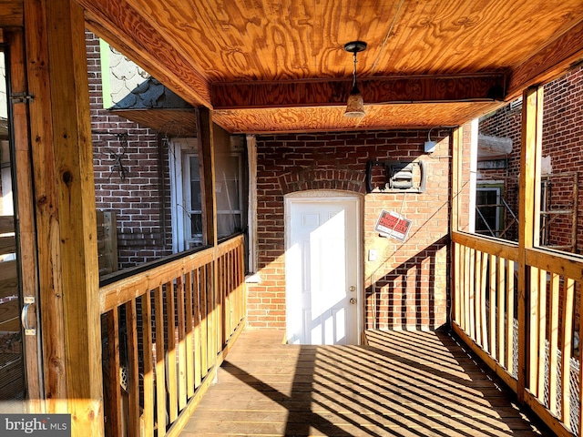 exterior space featuring brick siding