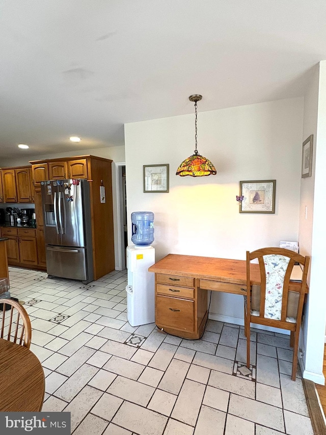 dining room featuring recessed lighting