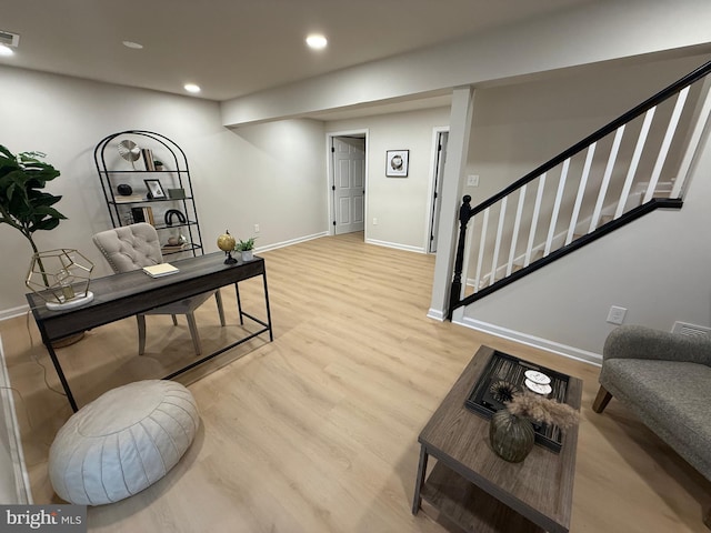 office with recessed lighting, wood finished floors, visible vents, and baseboards