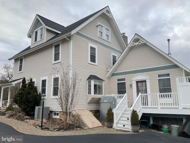 view of front of property with cooling unit