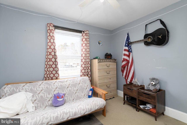 bedroom with baseboards, carpet floors, and ceiling fan
