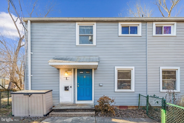 view of front of home with fence