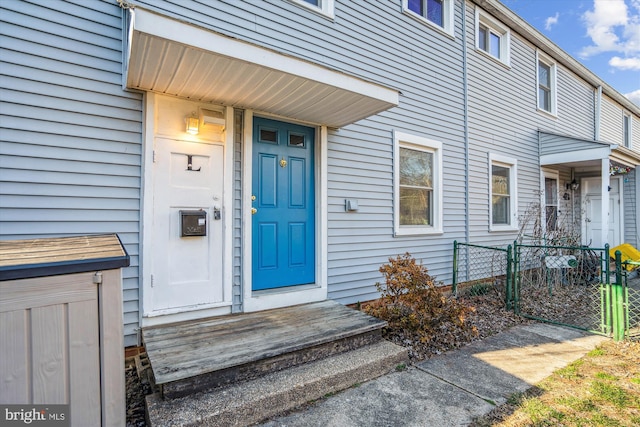 property entrance with fence