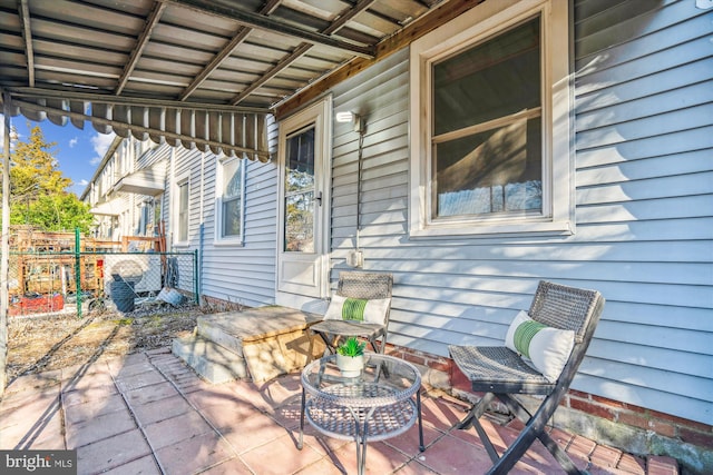 view of patio / terrace with fence