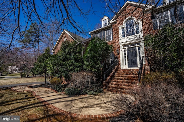 view of front of property with brick siding