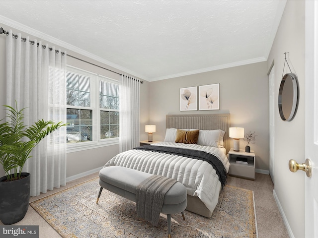 carpeted bedroom with baseboards, a textured ceiling, and ornamental molding