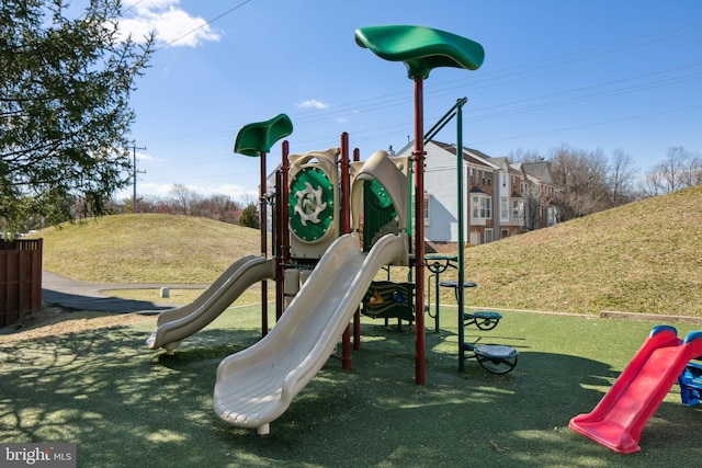 communal playground with a lawn