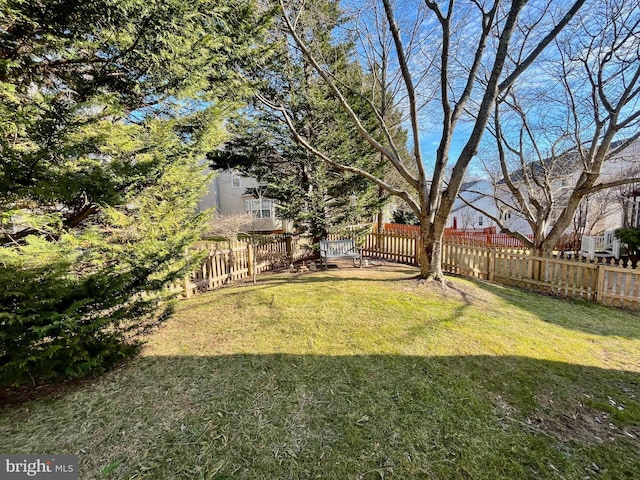 view of yard featuring fence