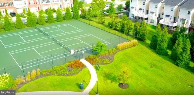 birds eye view of property with a residential view