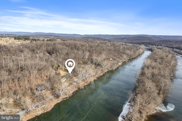 birds eye view of property featuring a water and mountain view